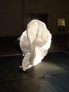 Eva Baumann performing in "Unsichtbare Orte". Photo: Helen Varley Jamieson.